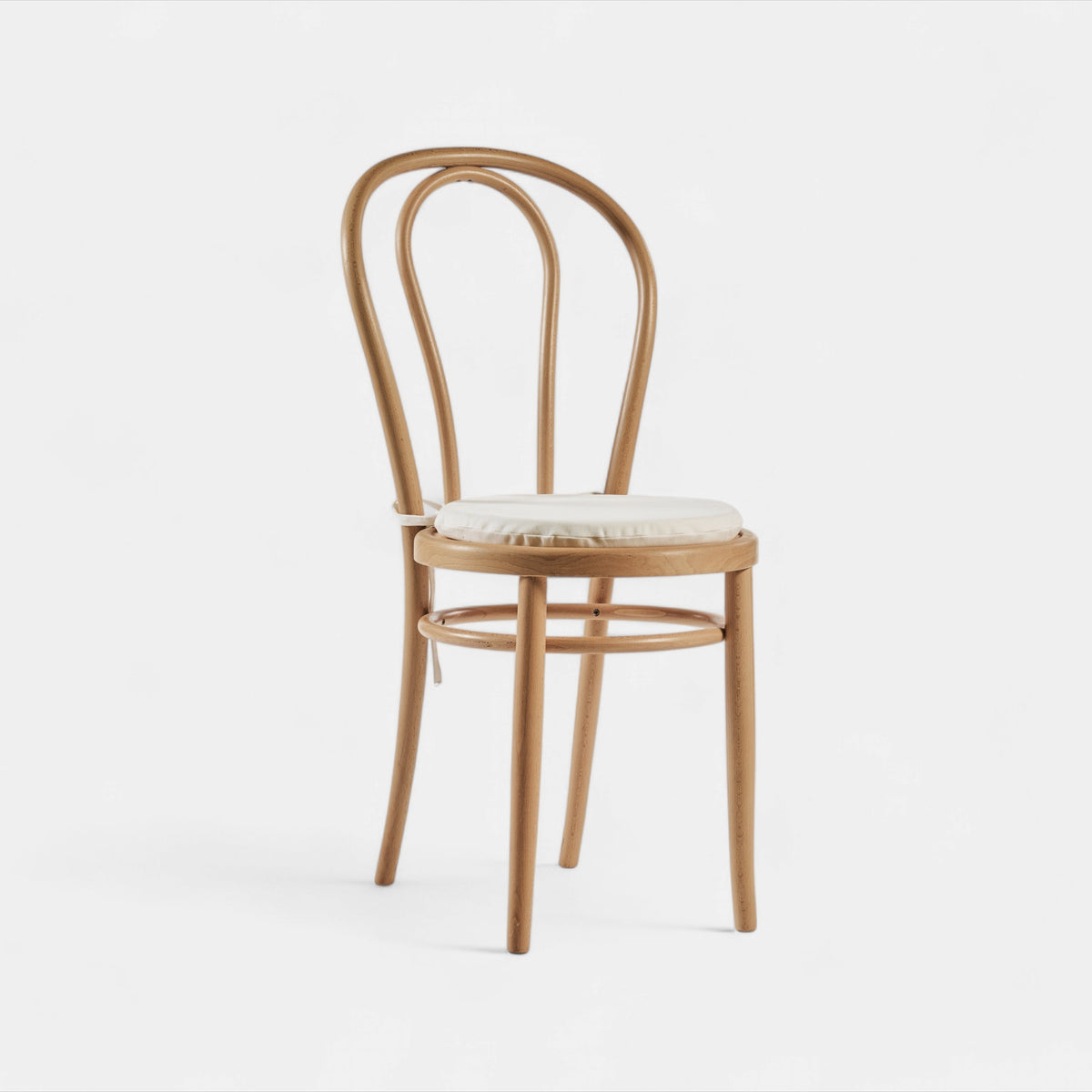 Round white cushion for chair