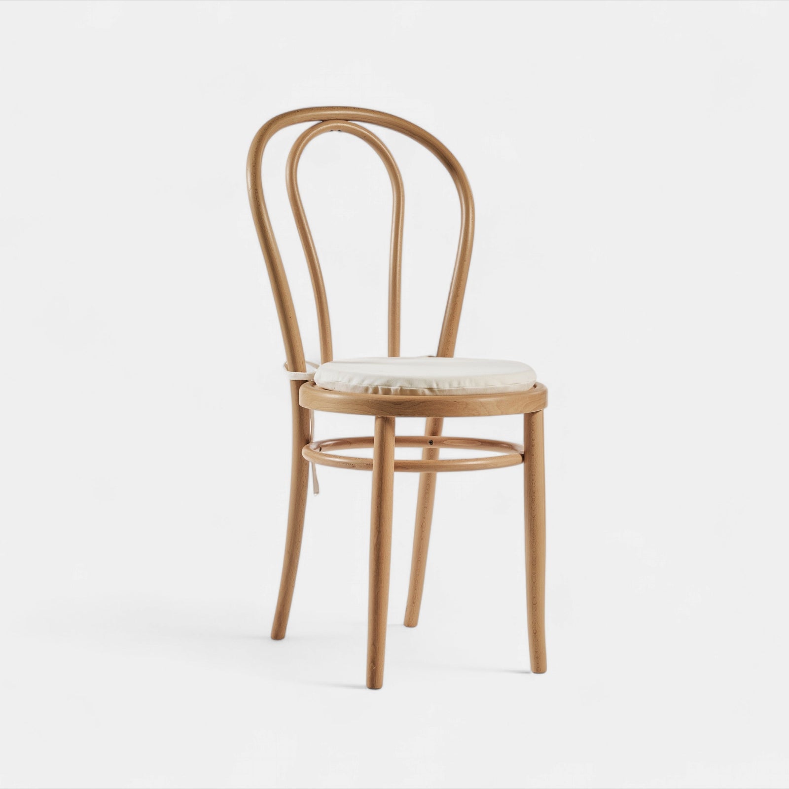 Round white cushion for chair